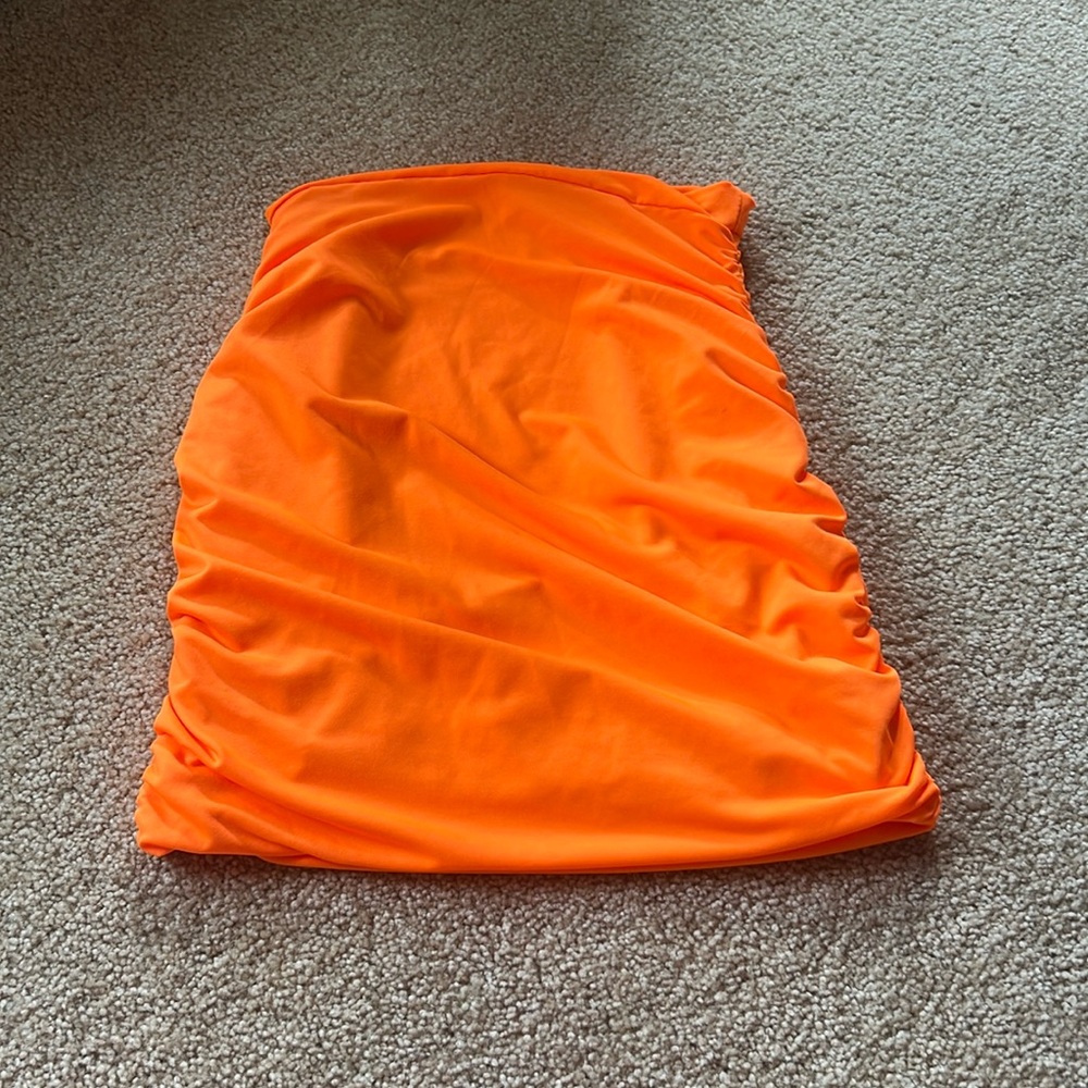 Bright orange skirt